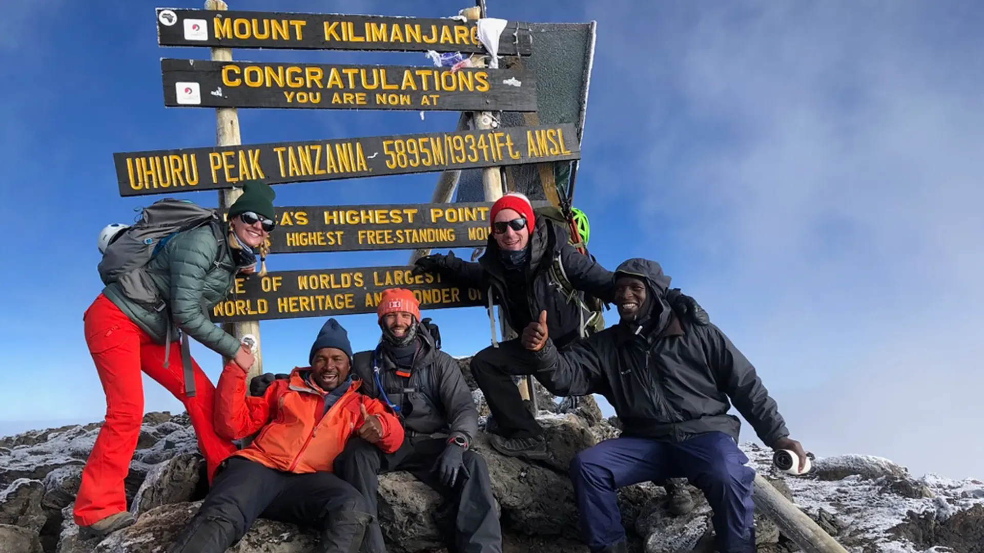 Climbers at the top of Mount Kilimanjaro