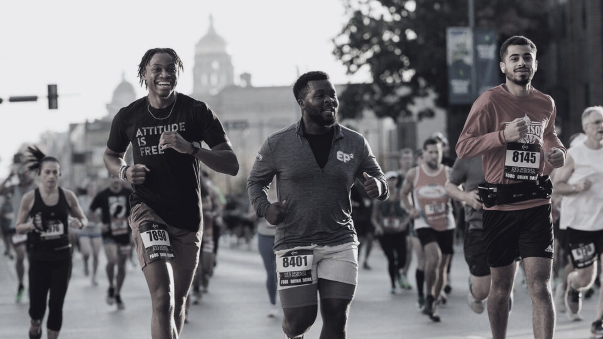 Photo of runners smiling