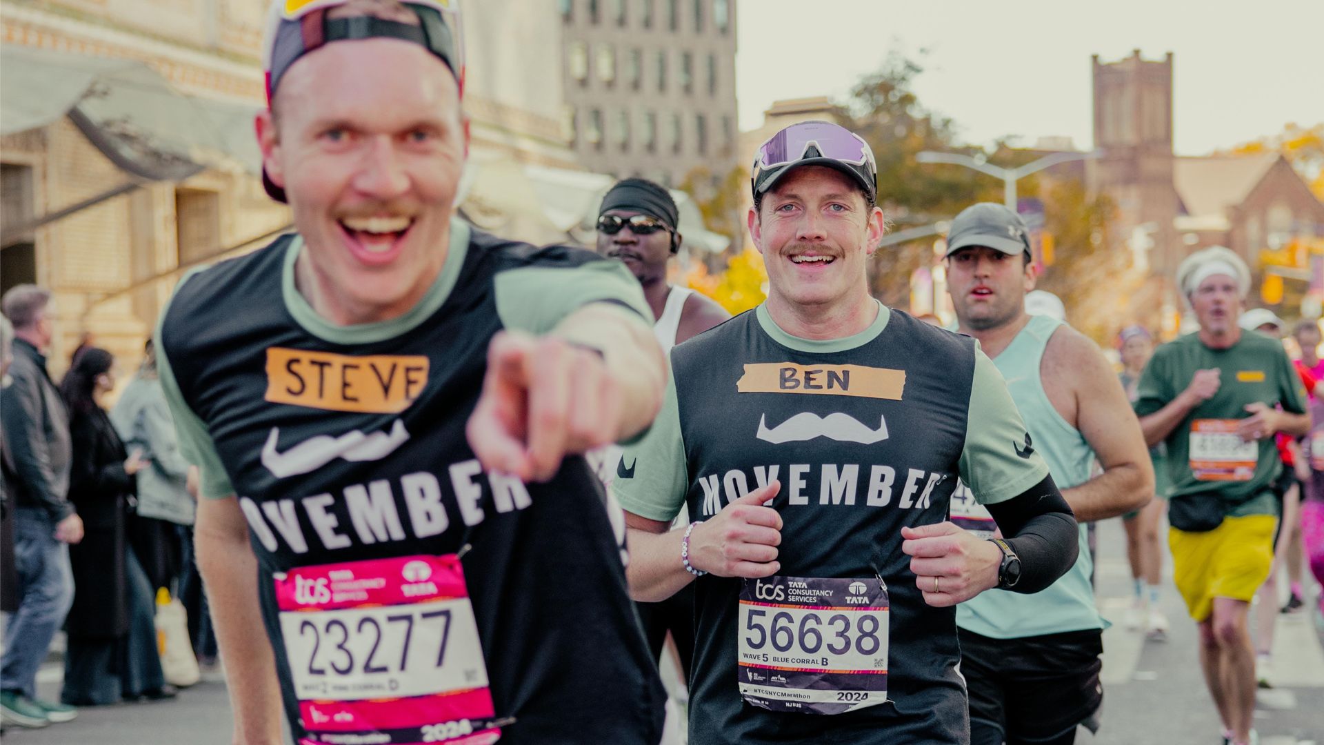 2 Movember participants running the NYC Marathon