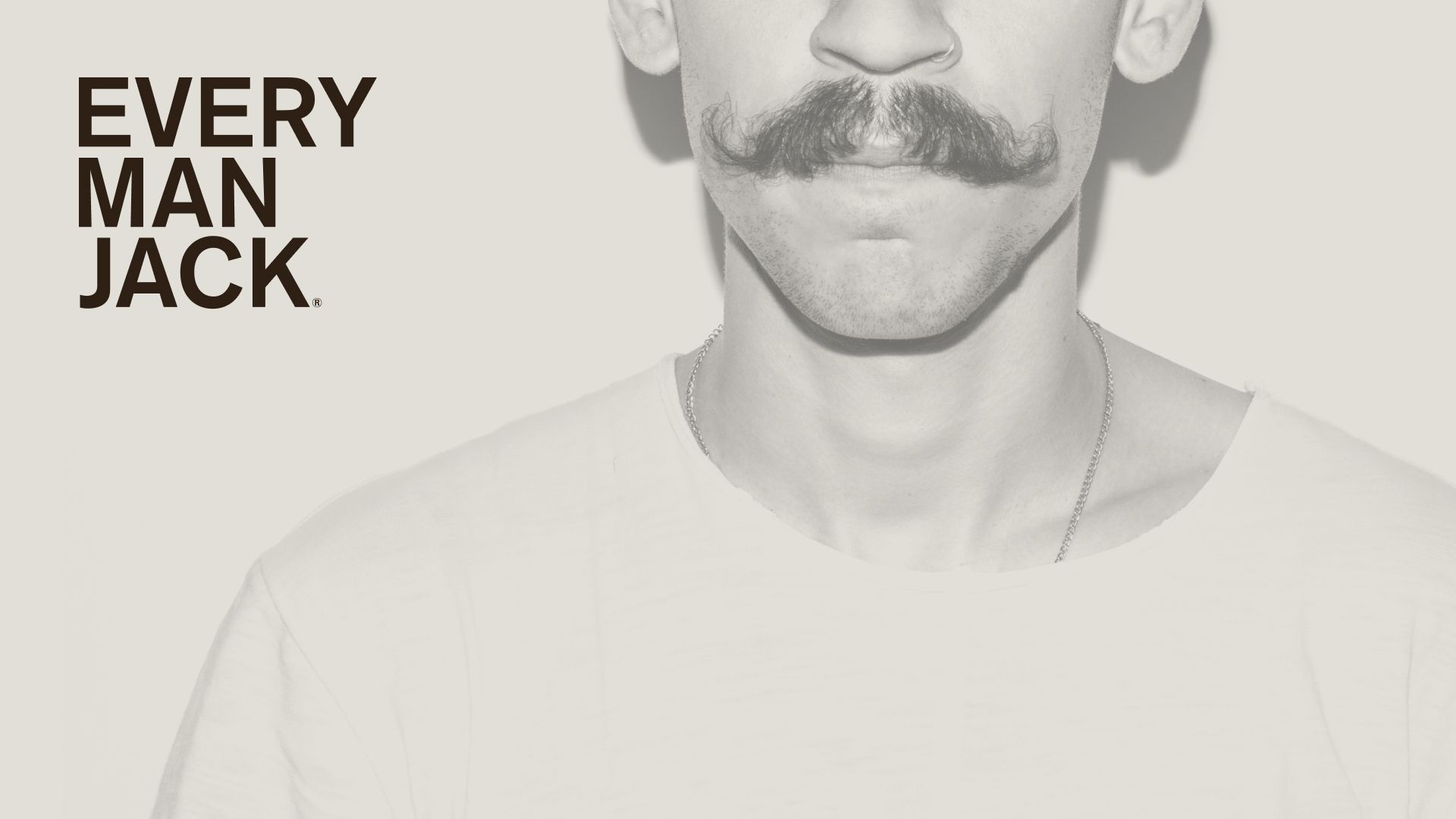 A logo that says "Every Man Jack" appears next to the photo of the lower half of a moustachioed man's face