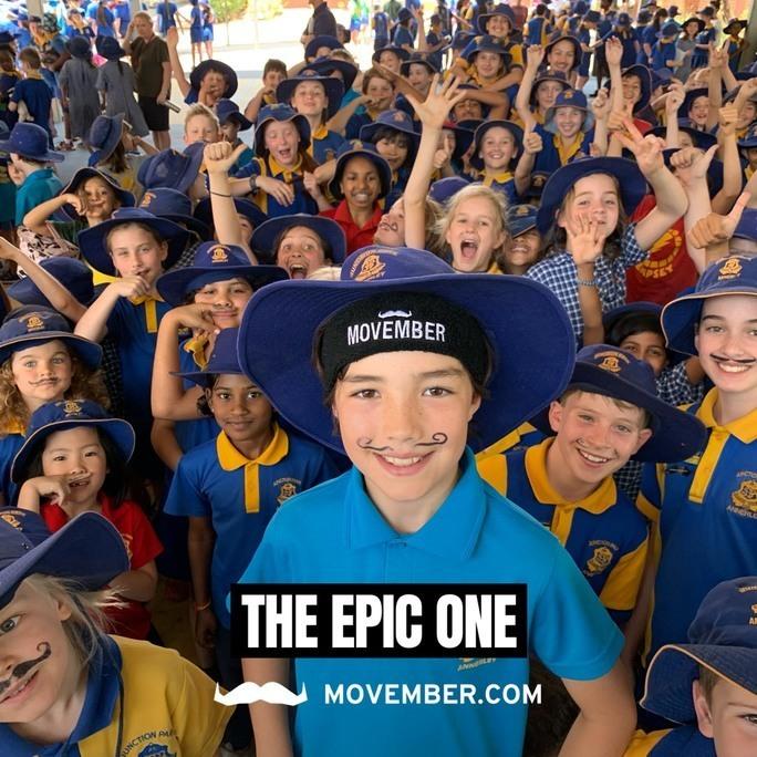 Schoolboy Parker Renshaw standing at the head of his class.