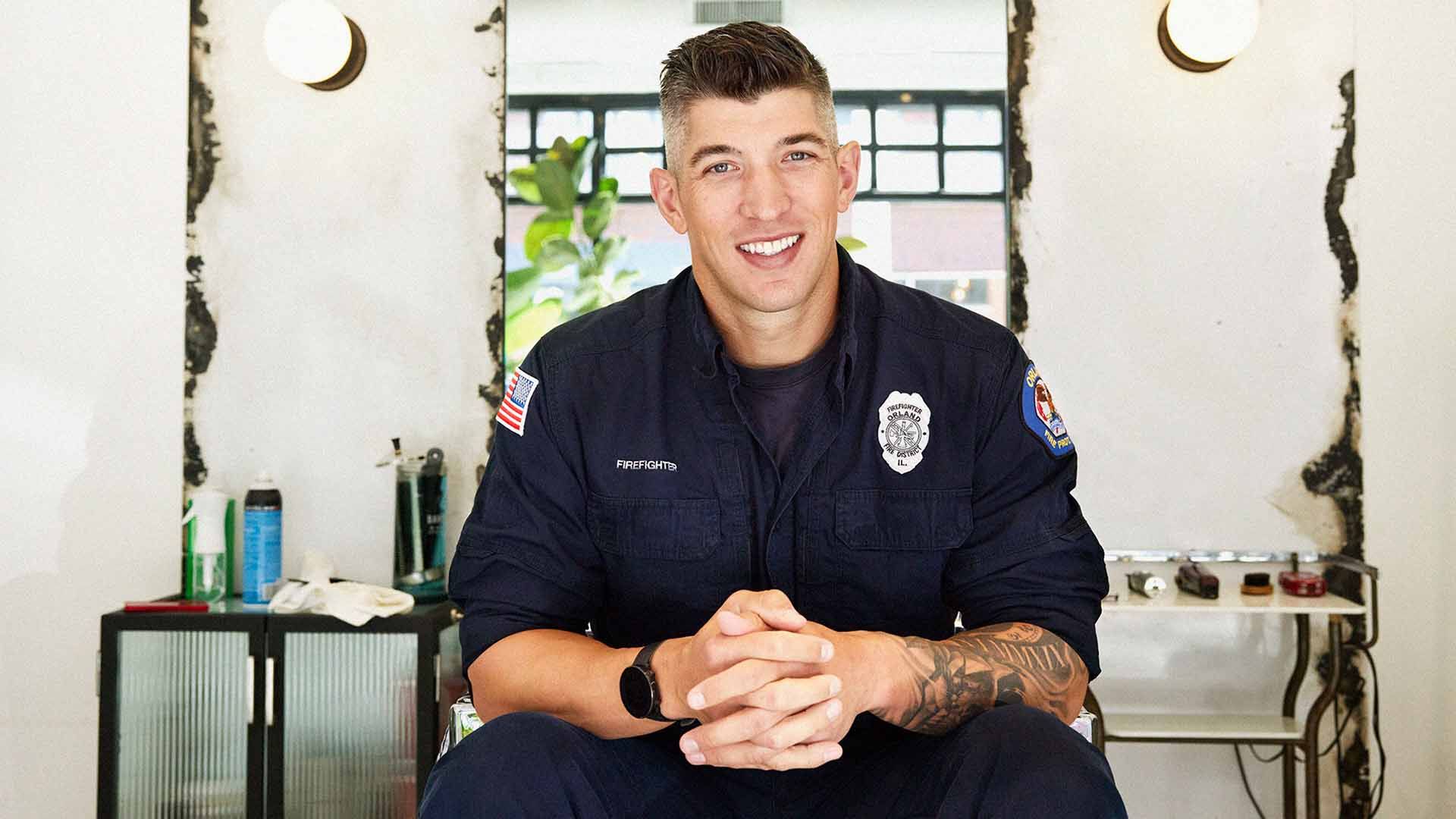 Smiling emergency worker looking to camera.