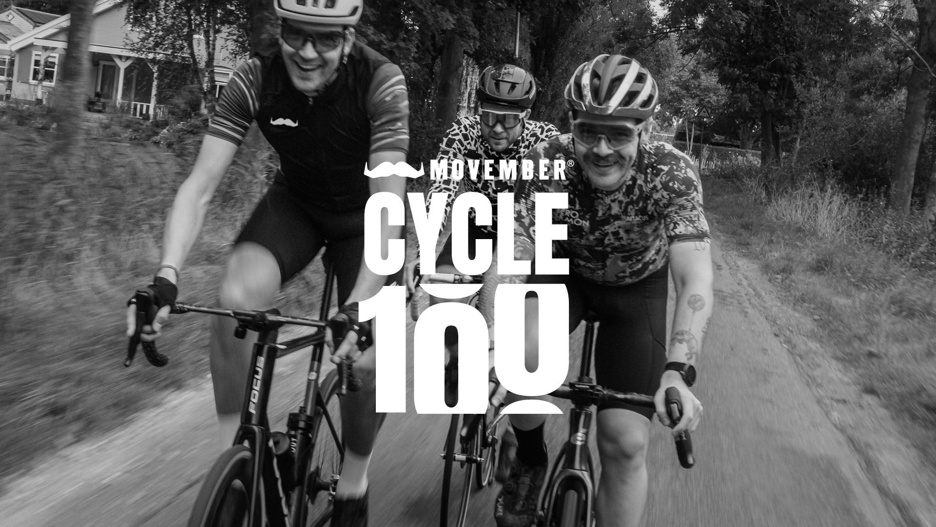 Black and white photo of cyclists on a trail, raising money for Movember.