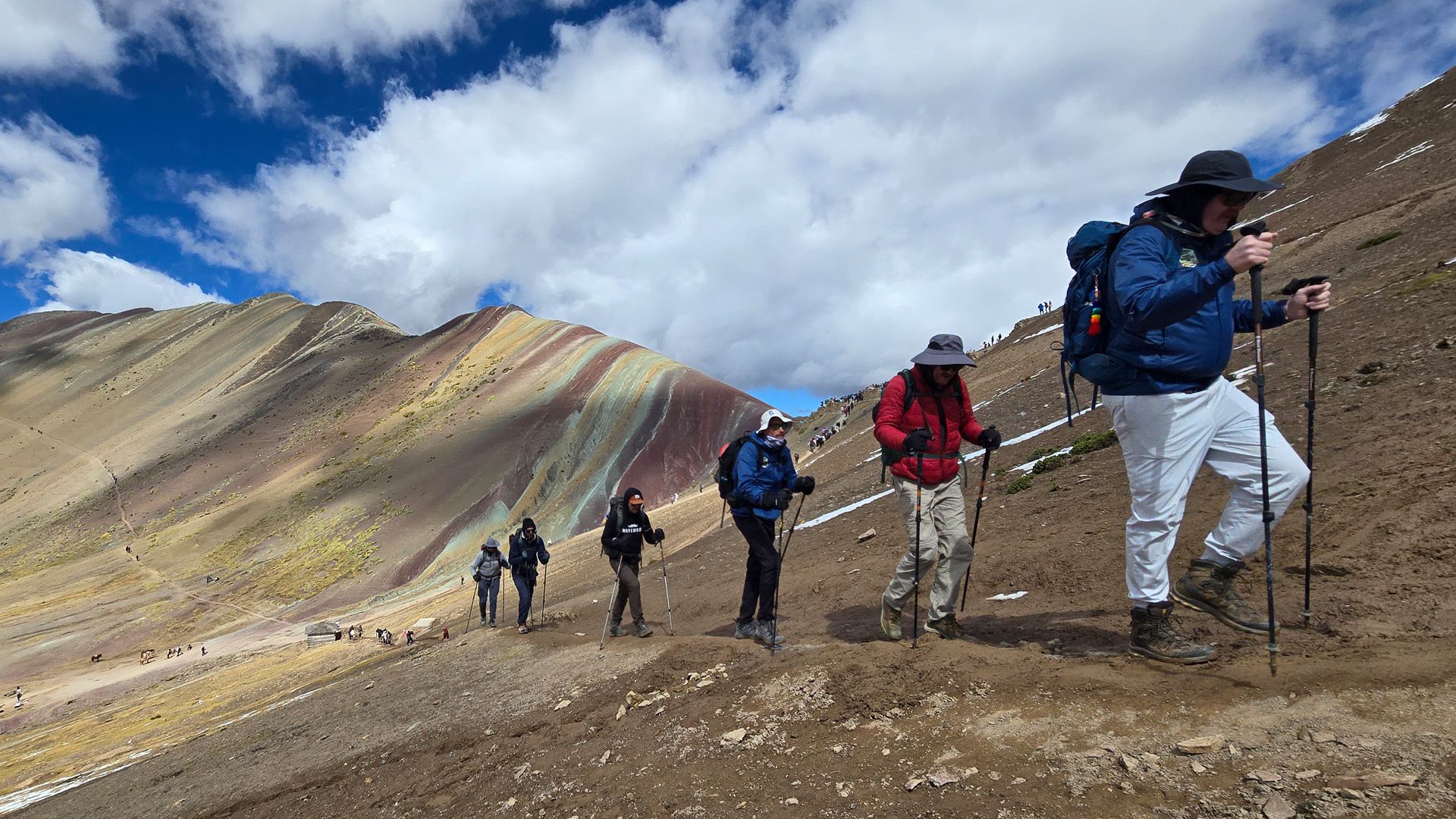 Mo Bros climbing Rainbow Mountain in Peru